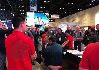INFiLED staff is explaining products to visitors at InfoComm 2017